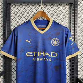 Camisa Manchester City Away 2023/24 - Puma Torcedor Masculina - Azul/Dourada