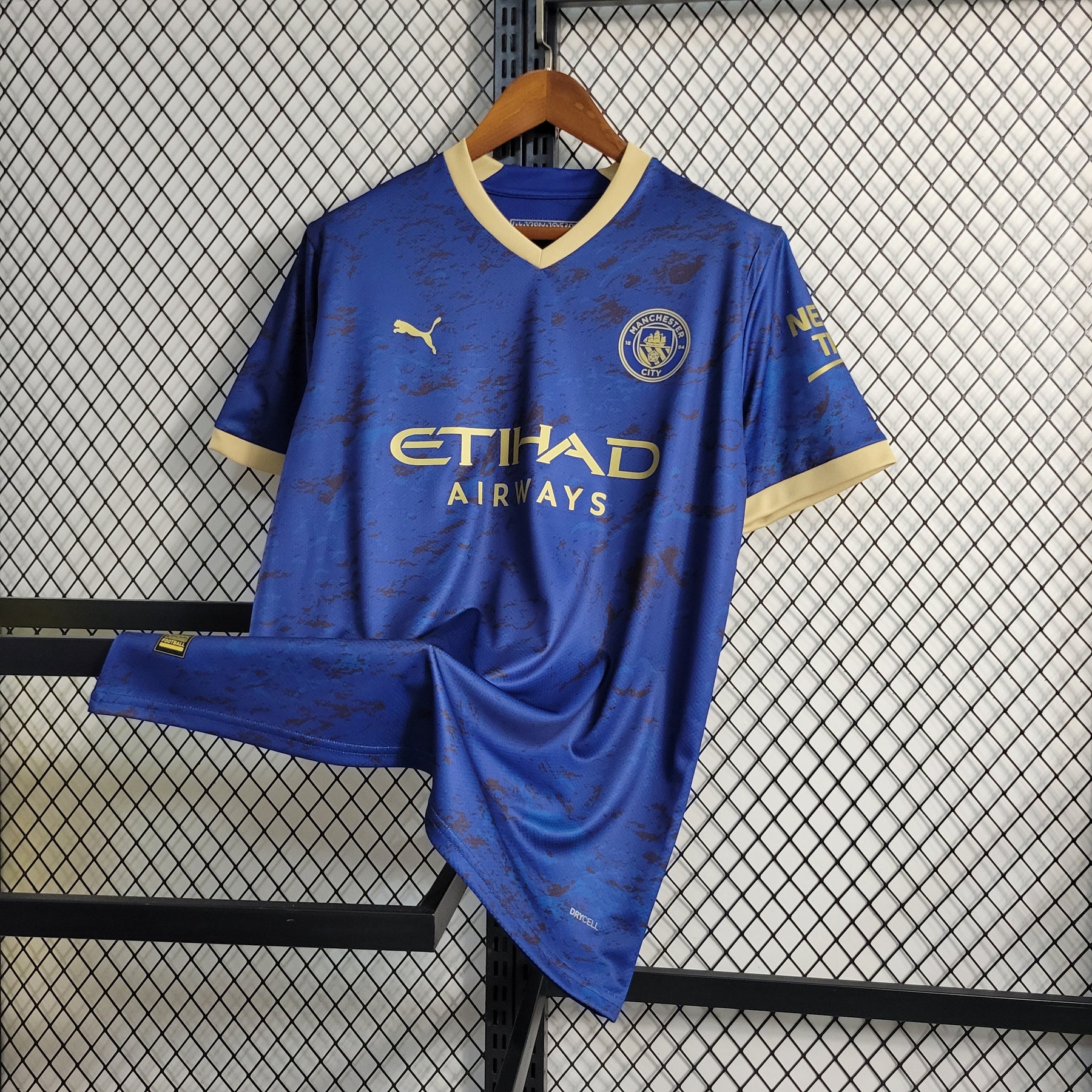 Camisa Manchester City Away 2023/24 - Puma Torcedor Masculina - Azul/Dourada