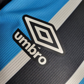 Camisa Grémio Home 2023/24 - Umbro Jogador Masculina - Azul/Preta