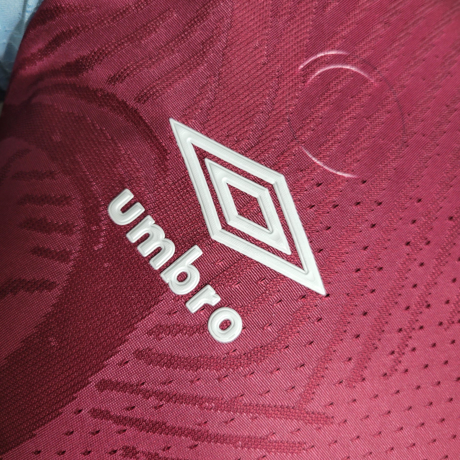 Camisa West Ham Home 2023/24 - Umbro Jogador Masculina - Bordo/Azul