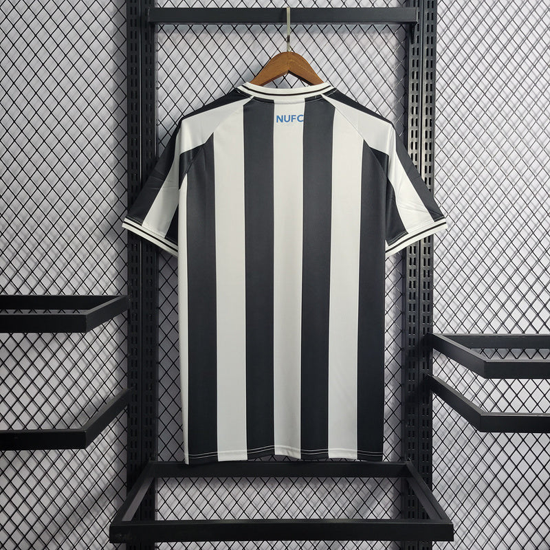 Camisa Newcastle Home 2022/23 - Castore Torcedor Masculina - Branca/Preta