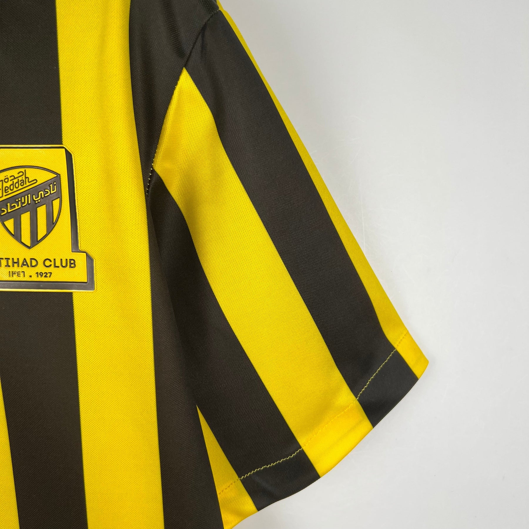 Camisa Al-Ittihad Home 2023/24 - Nike Torcedor Masculina - Amarela/Preta