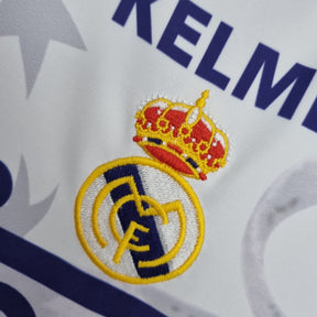 Camisa Real Madrid 1997/98 - Kelme Retrô Masculina - 7 Champions League - Branca/Azul