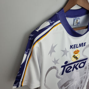 Camisa Real Madrid 1997/98 - Kelme Retrô Masculina - 7 Champions League - Branca/Azul